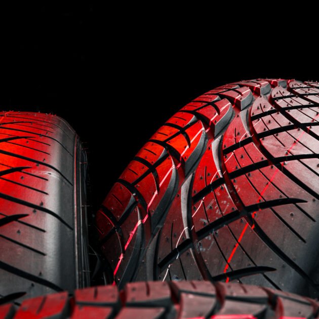 New tyres background. Car tyres close up